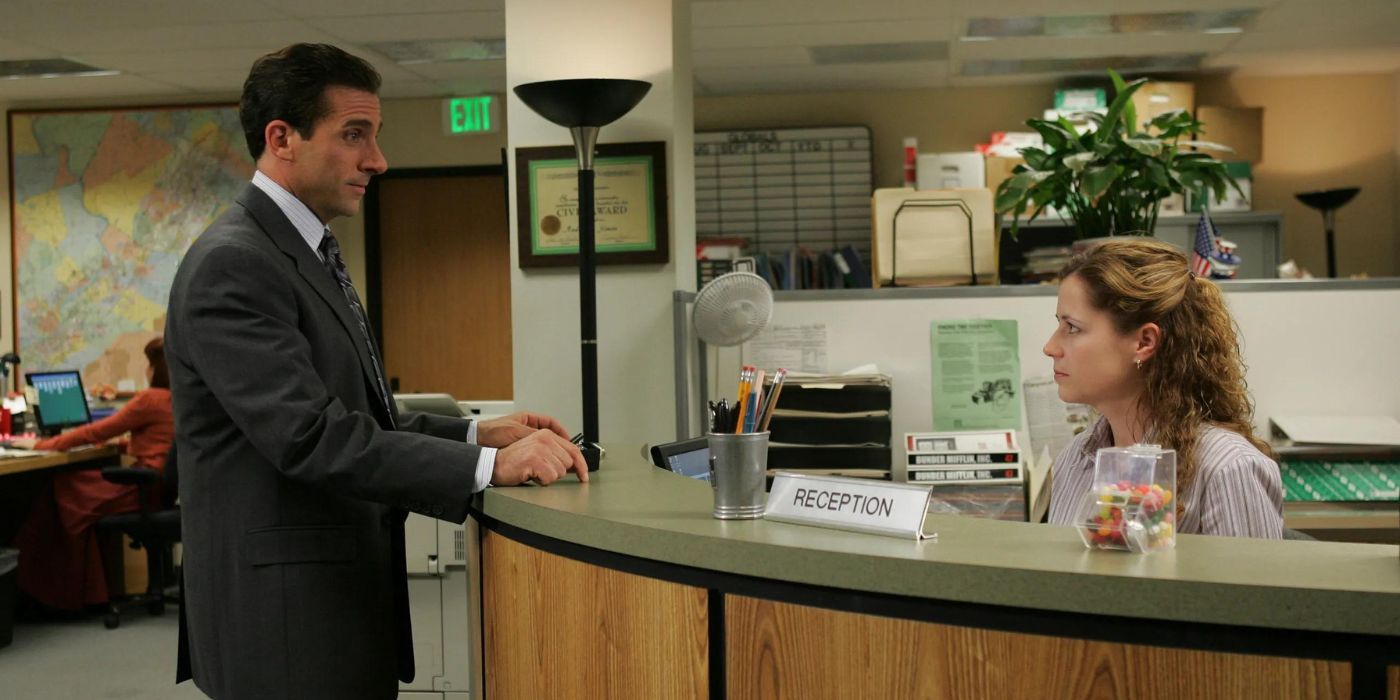 Michael Scott approaches Pam's desk in The Office