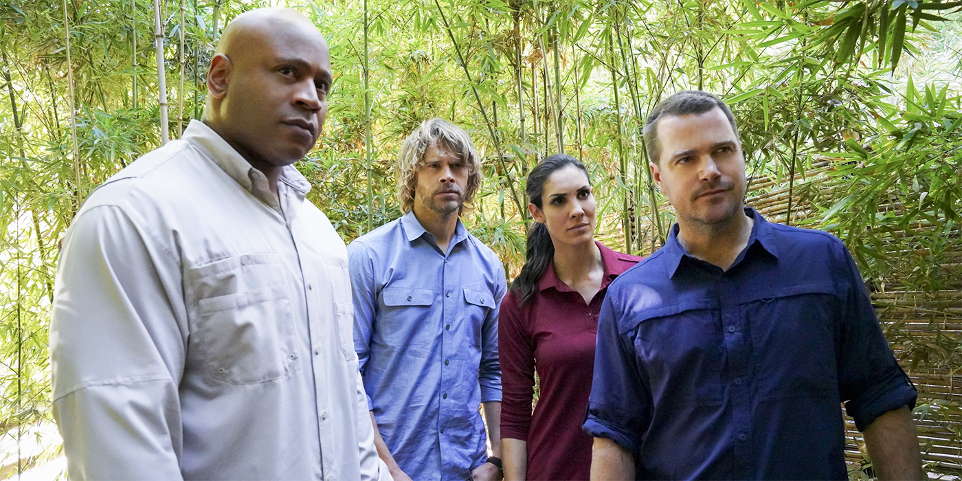 LL Cool J as Sam Hanna with Eric Christian Olsen as Marty Deeks and Daniela Ruah as Kensi Blye and Chris O'Donnell as G Callen in NCIS Los Angeles in the woods