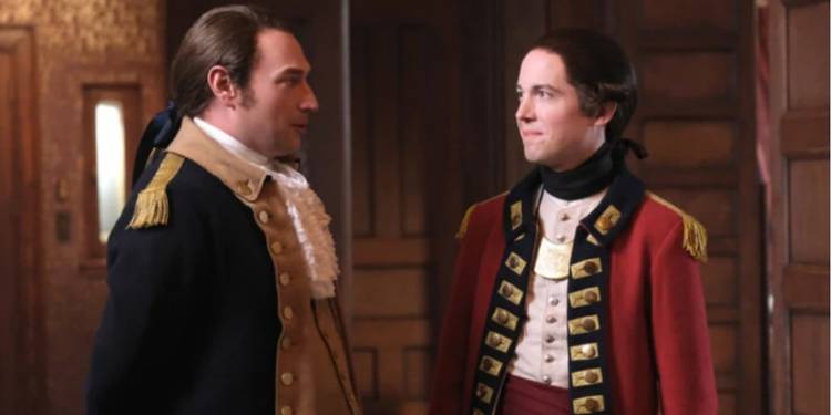 nigel-and-isaac-talking-in-ghosts CBS' Ghosts: Every Ghost Time Period & Backstory Explained