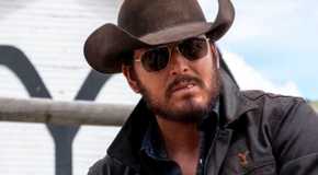 Cole Hauser wearing sunglasses and a cowboy hat as Rip Wheeler in Yellowstone