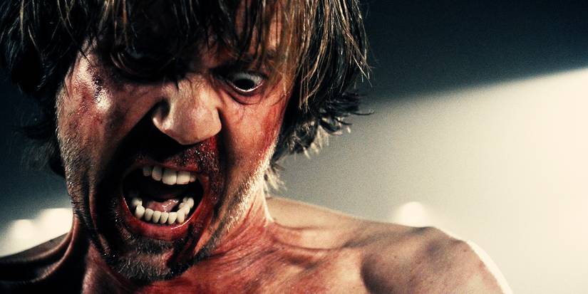 10 Movies Too Upsetting To Watch A Second Time 3 Srđan Todorović as Miloš with an angry expression on his face in A Serbian Film.