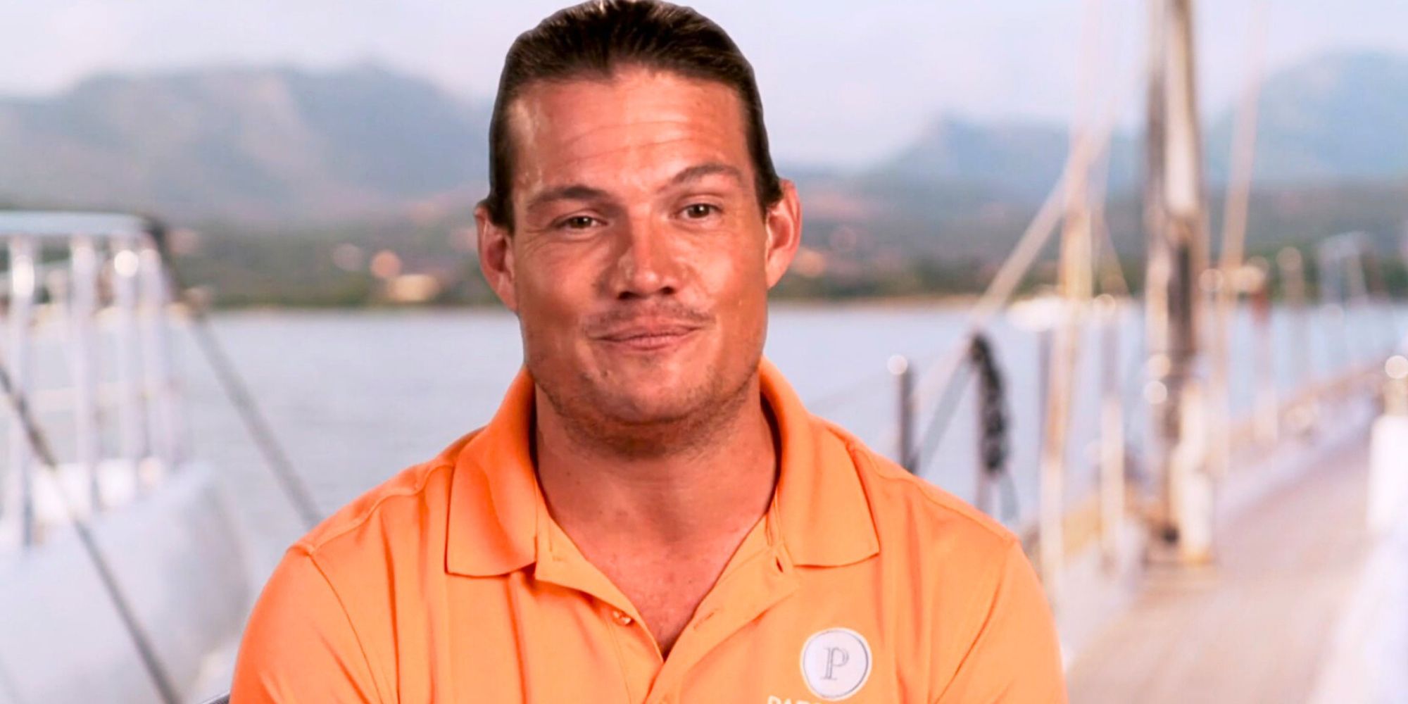 Below Deck Sailing Yacht's Gary King from Season 4 in Orange Parsifal III shirt