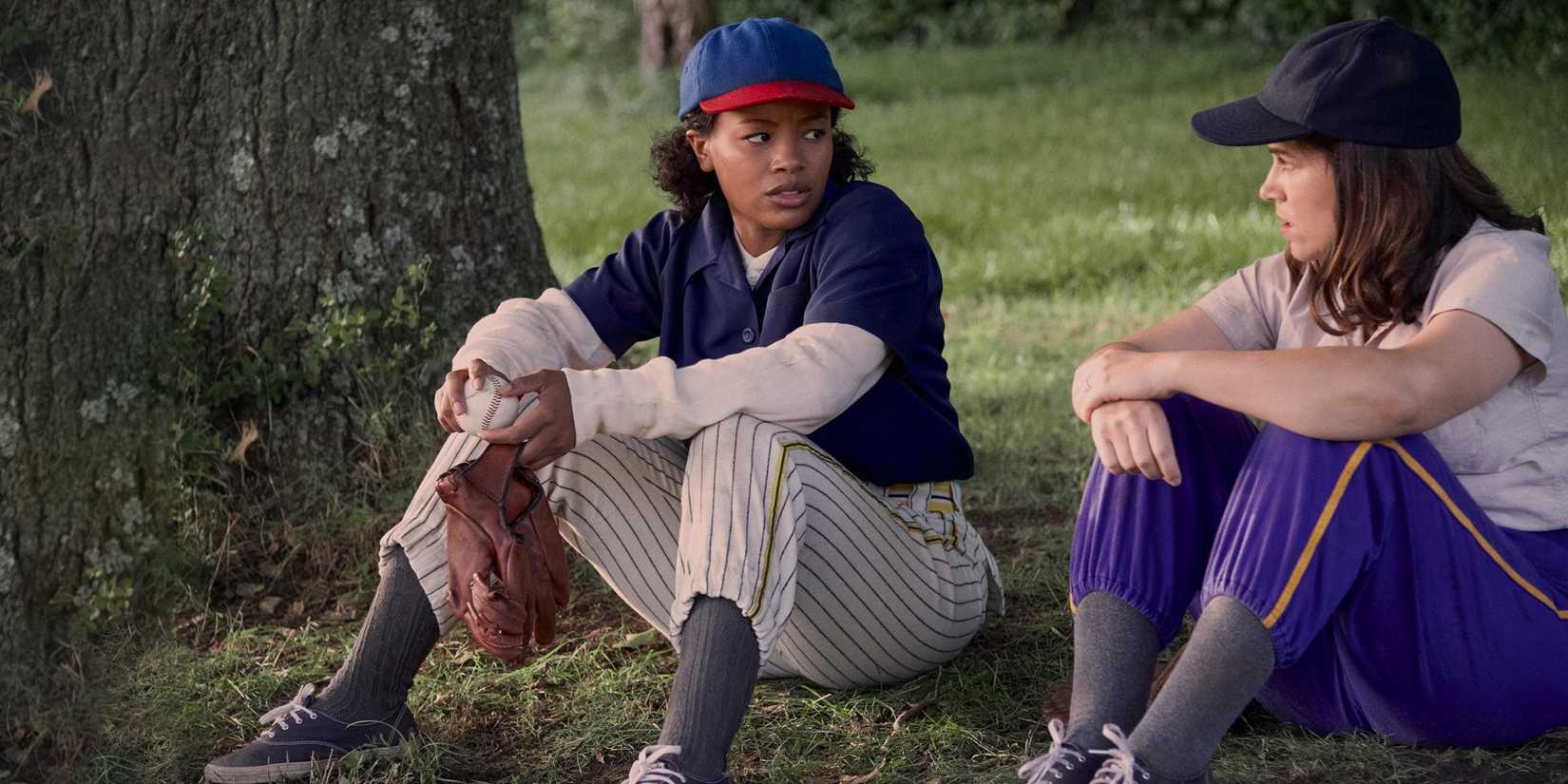 Carson (Abbi Jacobson) and Max (Chanté Adams) sit and talk in A League of Their Own