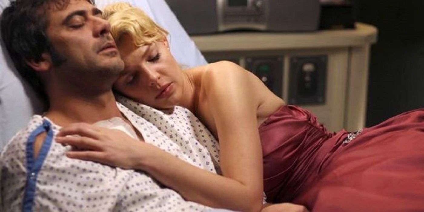 Denny and Izzie lying in a hospital bed on Grey's Anatomy