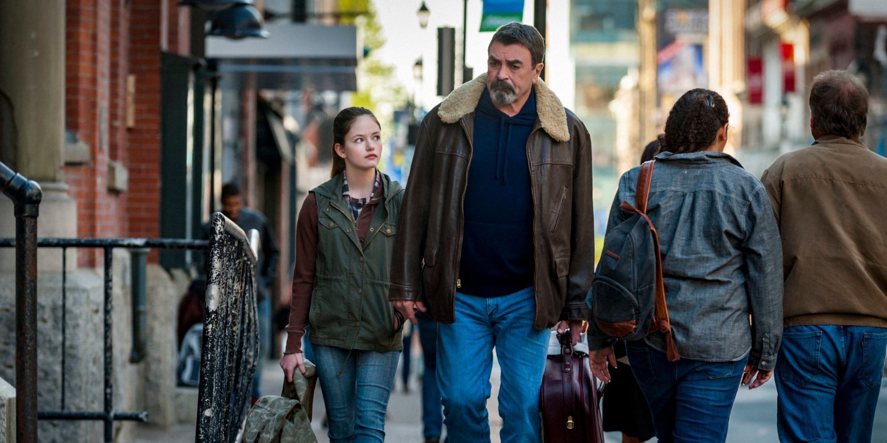 Jesse Stone and daughter walking