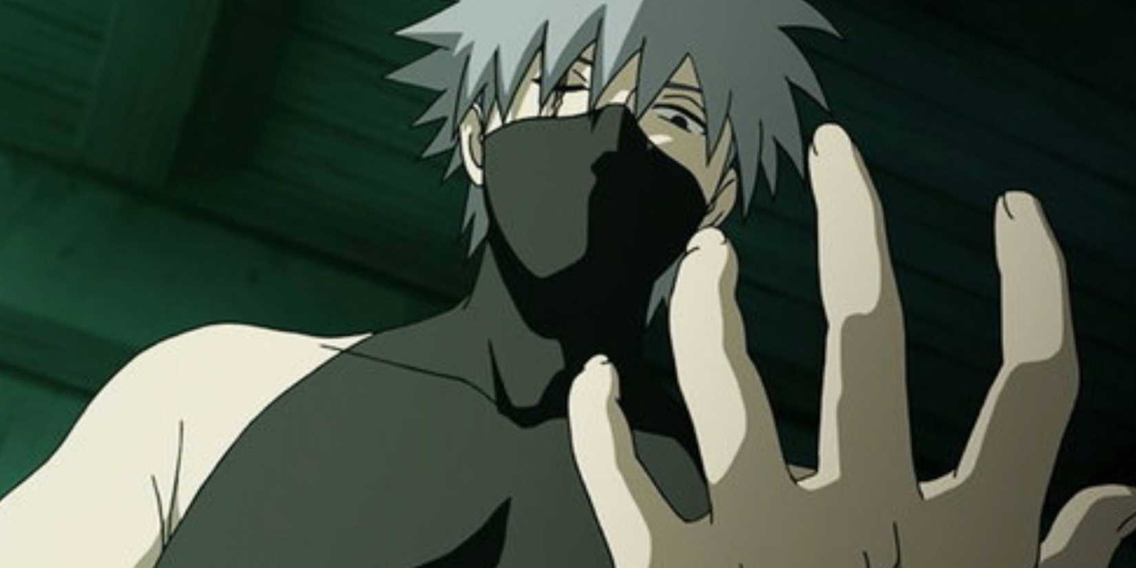 Kakashi from Naruto anime looks down at his hand in Shadow Of The Black Anbu episode.