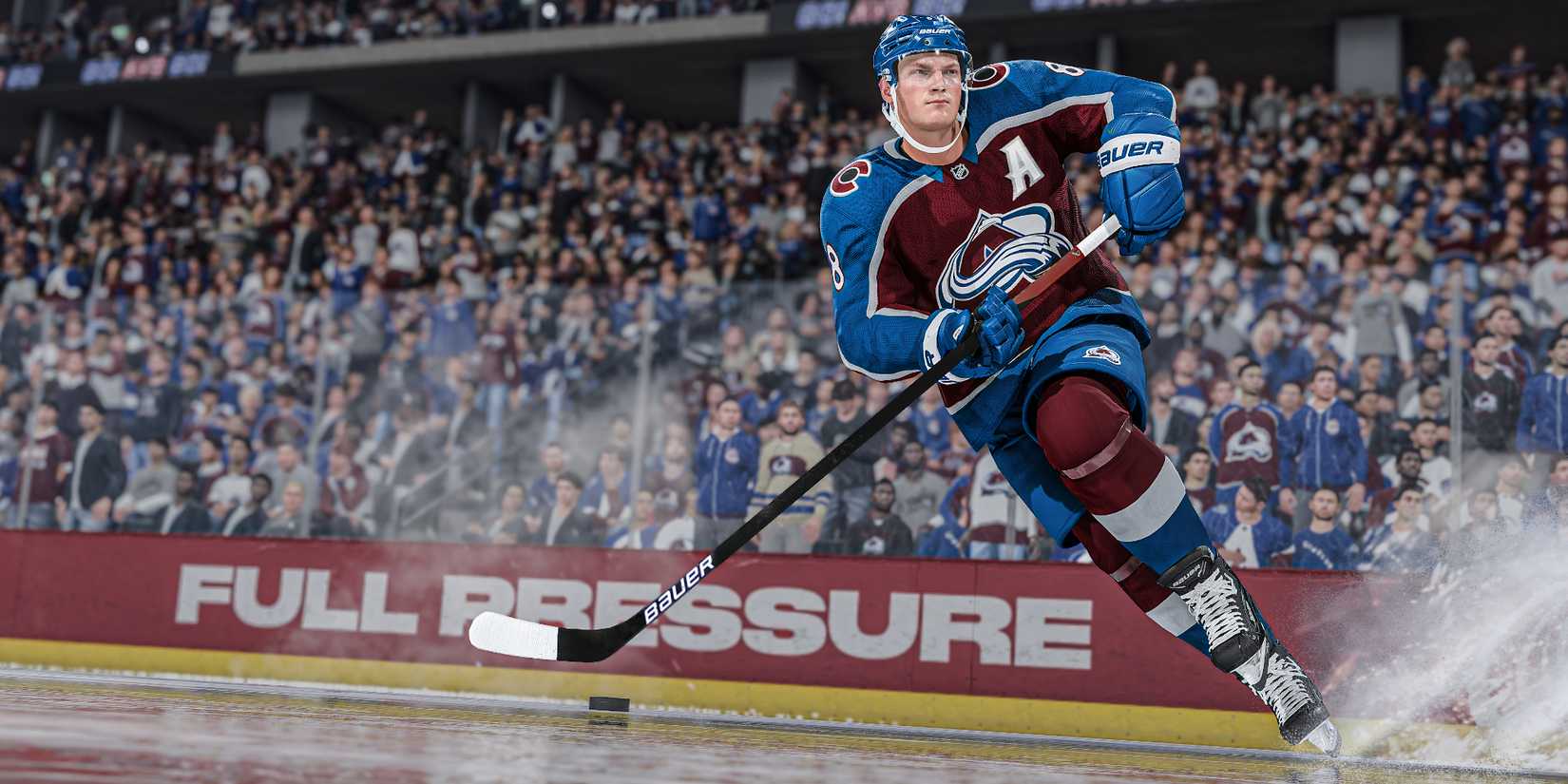 Screenshot from NHL 24 shows Avalanche player Cale Makar skating on the ice with ice particles exploding behind his skates as he handles the puck and stares toward the goalie.