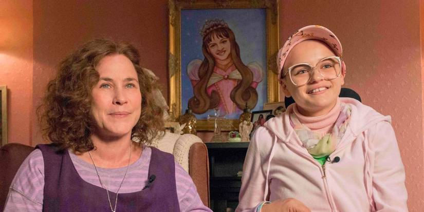 Patricia Arquette and Joey King holding hands in The Act 