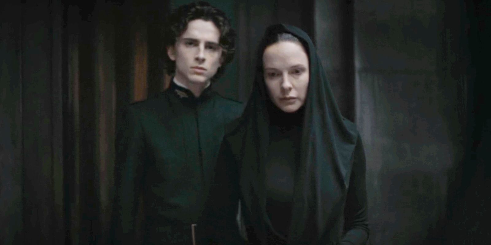 Timothee Chalamet as Paul and Rebecca Ferguson as Jessica dressed in black in Dune