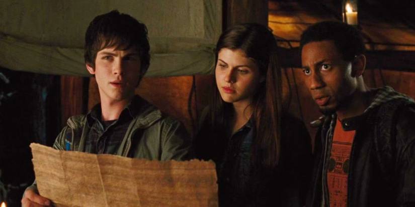 Percy Jackson, Annabeth e Grover em um mapa em The Lightning Thief