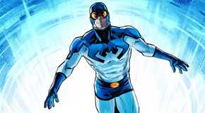 Ted Kord, in a blue superhero suit marked with a beetle over the chest, rises up from a background of blue lights.