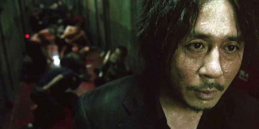 Choi Min-sik as Oh Dae-su leaving after the famous hallway fight scene in Oldboy