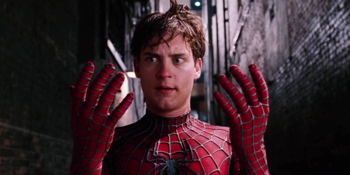 Tobey Maguire's Spider-Man looks at his hands in awe in Spider-Man (2002)