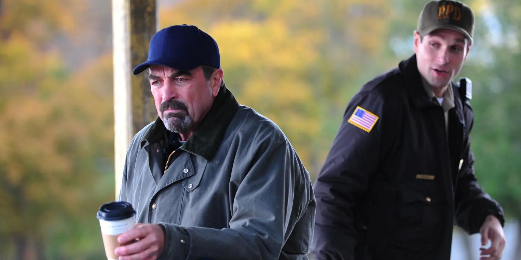 Tom Selleck as Jesse Stone with coffee on porch