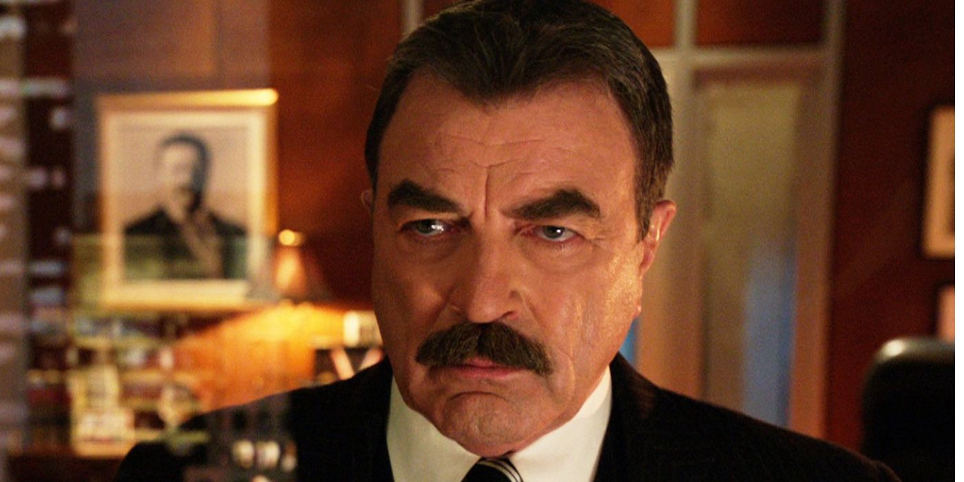 Frank Reagan (Tom Selleck) Staring Out a Window in Blue Bloods
