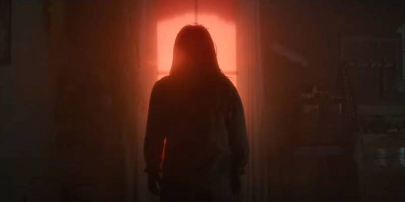 Brynn facing the aliens in No One Will save You