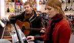 Guy and Girl singing in Once