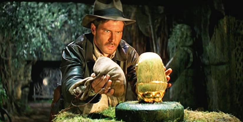 Harrison Ford as Indiana Jones using a sandbag to get the Golden Idol in Raiders of the Lost Ark.