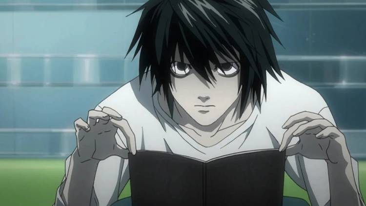 L (Death Note) sitting with his hands holding a journal