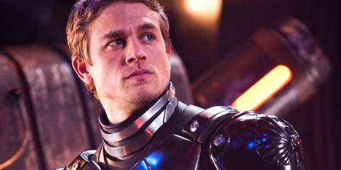 Charlie Hunnam as Raleigh Becket looking off to the side in a scene from Pacific Rim.