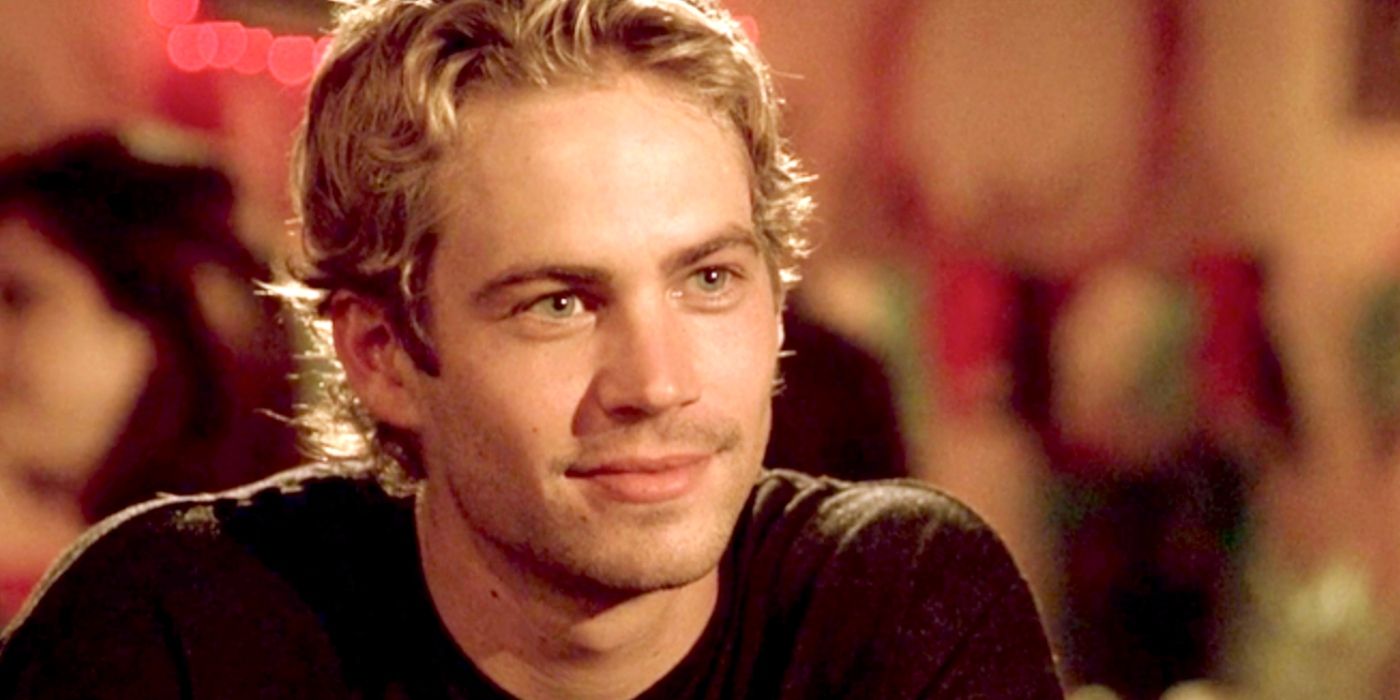 Paul Walker smiling as Brian O'Conner in Fast and Furious.