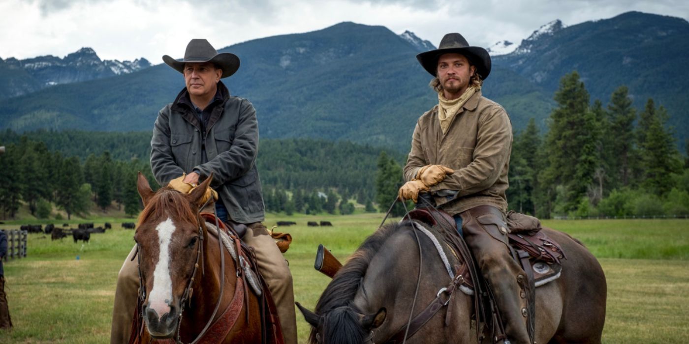 Kevin Costner and Luke Grimes as John and Kayce Dutton on horseback in Yellowstone