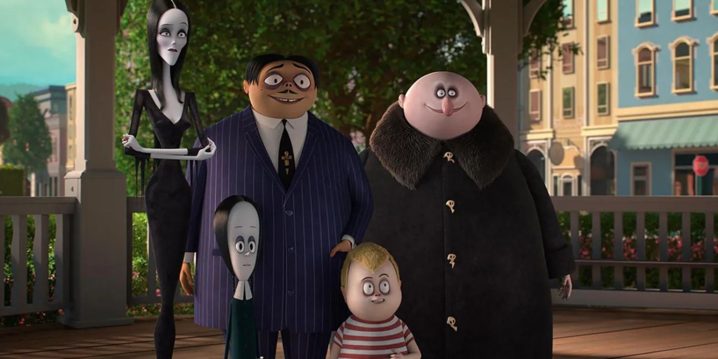 The Addams Family smiling in a park in The Addams Family 2