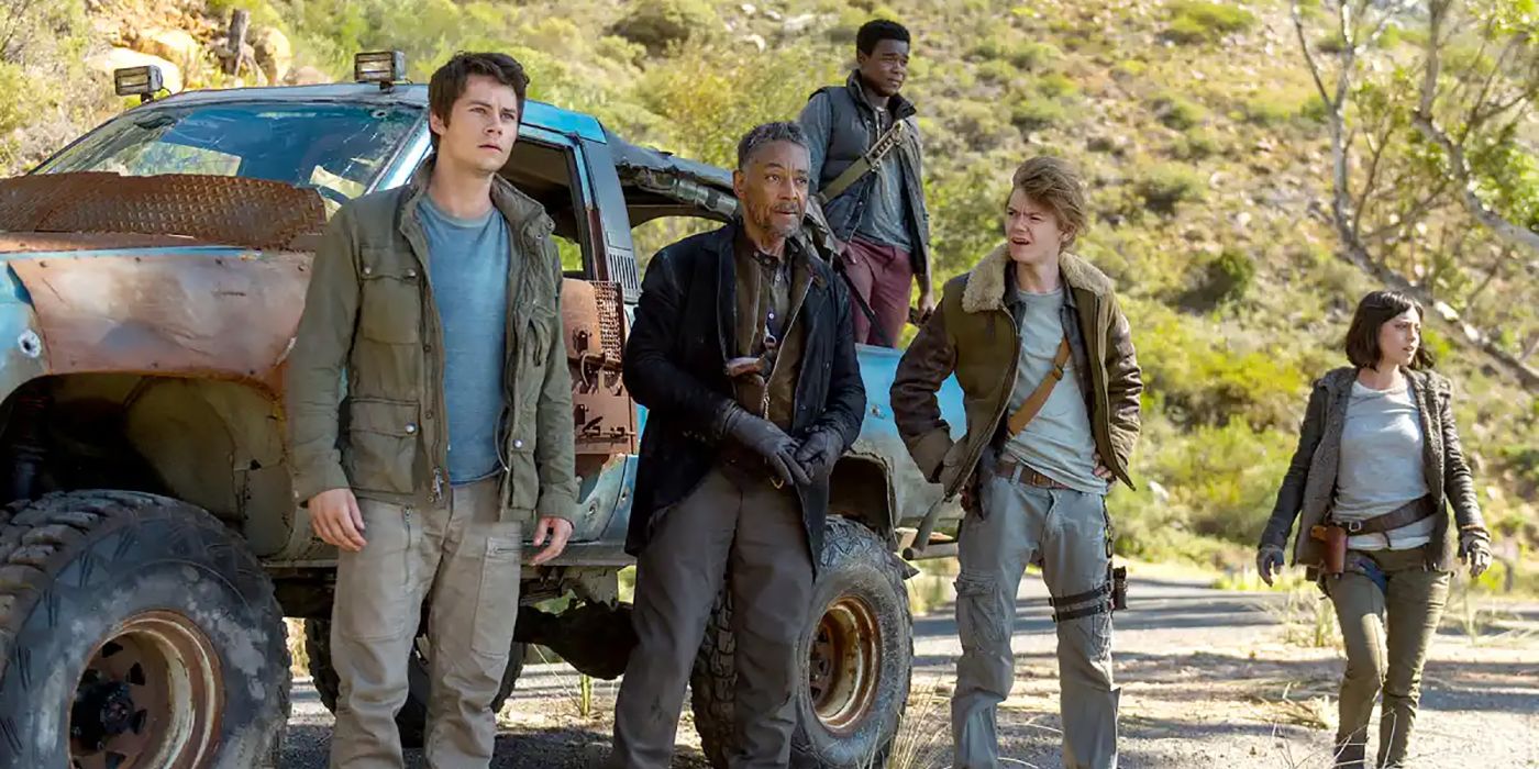The Maze Runner: The Death Cure's Dylan O'Brien, Giancarlo Esposito, and Thomas Brodie-Sangster in front of a car