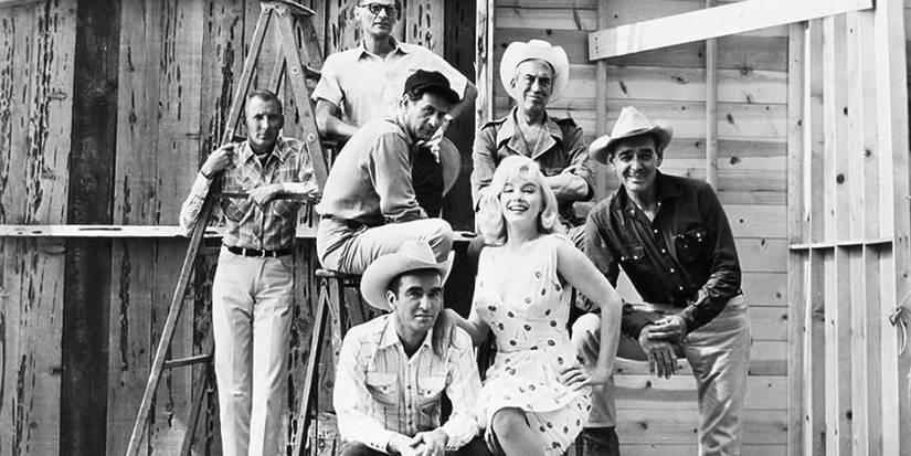 The cast and creatives behind The Misfits assembled for a photo