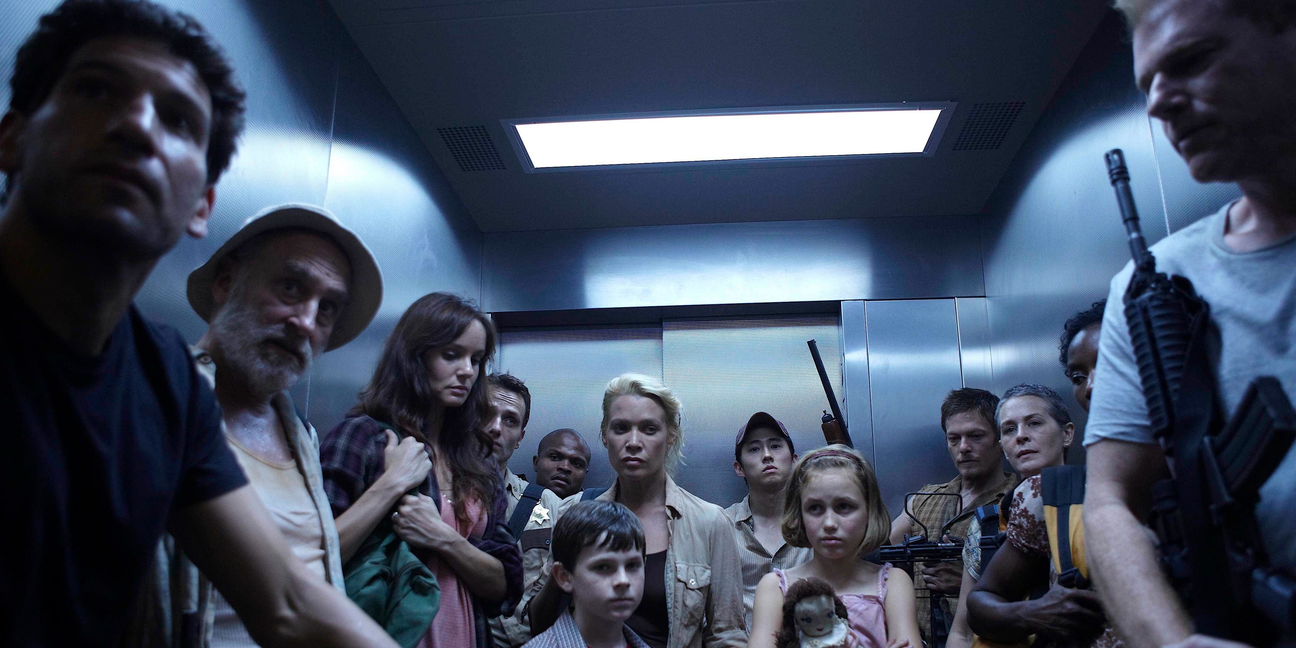 The Walking Dead's main group huddled in an elevator in season 1's CDC episode.