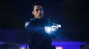 Carlos points his gun in 911 Lone Star