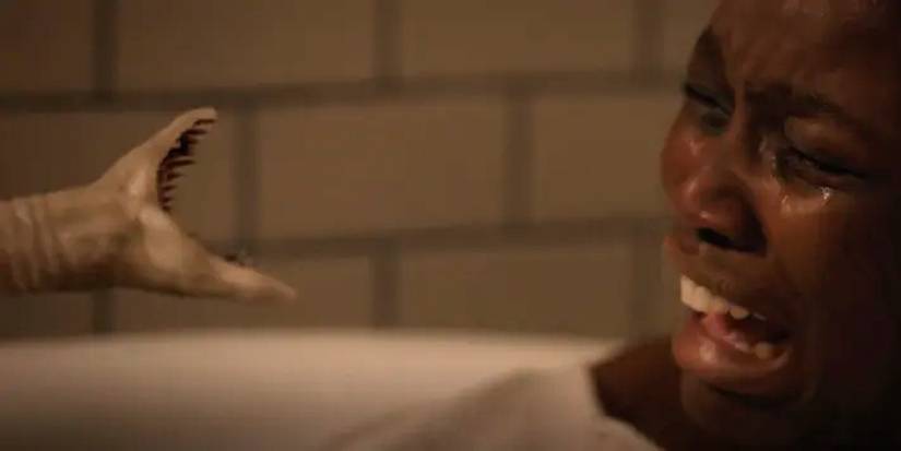 The tapeworm and Vivan (Laura Kariuki) on American Horror Stories