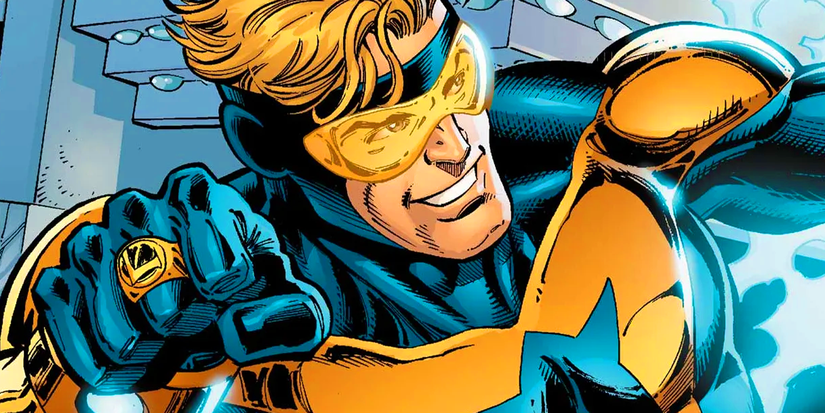 Booster Gold smiling, clenching a fist and looking sideways