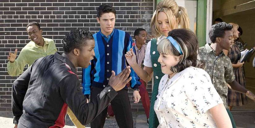 Tracy, Seaweed, Link, and Penny dancing in Hairspray (2007).