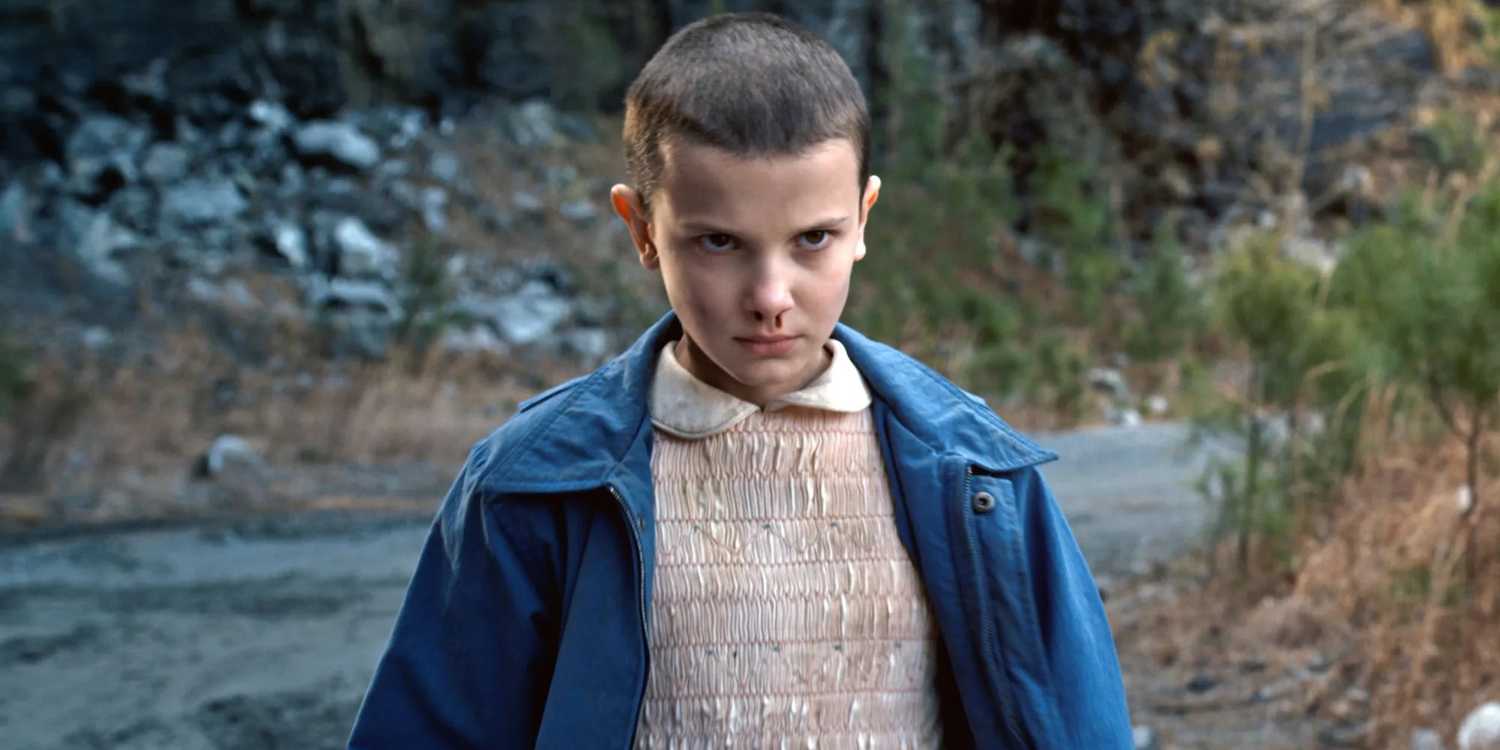 Millie Bobby Brown as Eleven with a bloody nose in Stranger Things.