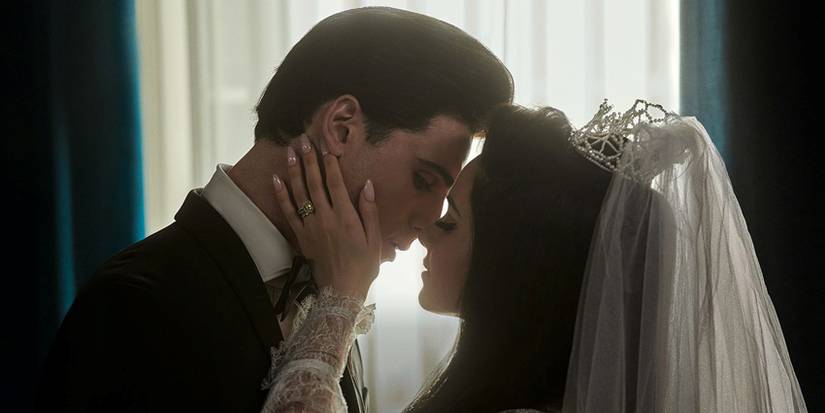 Элвис и Присила обнимаются в день их свадьбы в "Присиле"