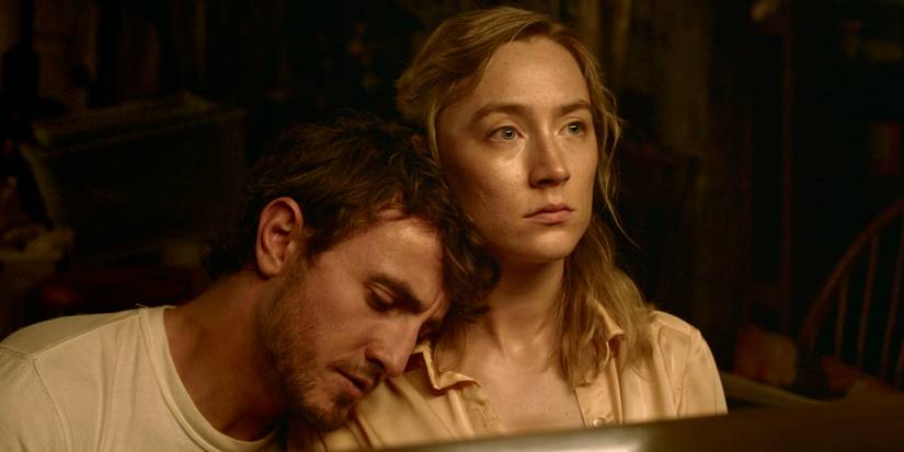 Paul Mescal leaning on Saoirse Ronan in Foe