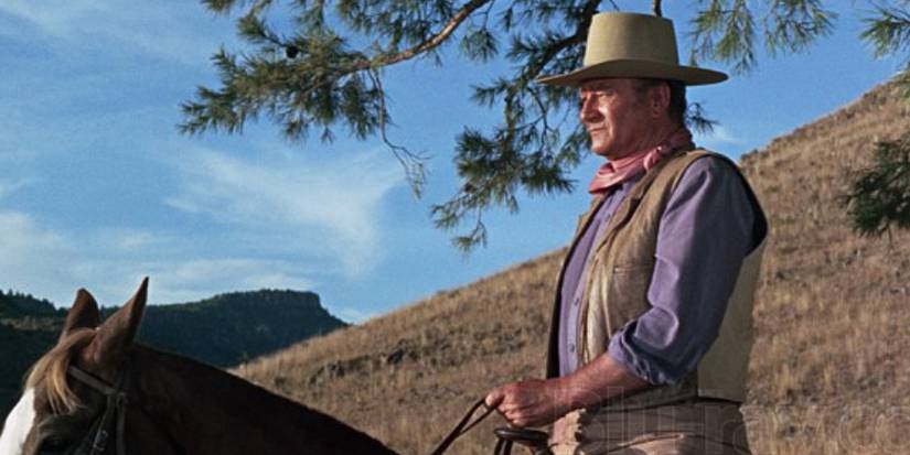 John Wayne como John Chisum a cavalo em Chisum (1970)