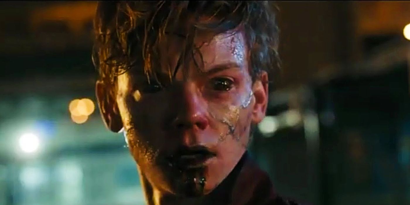 Newt's (Thomas Brodie-Sangster) face has black veins, eyes, and goo coming out of his mouth in The Maze Runner: The Death Cure