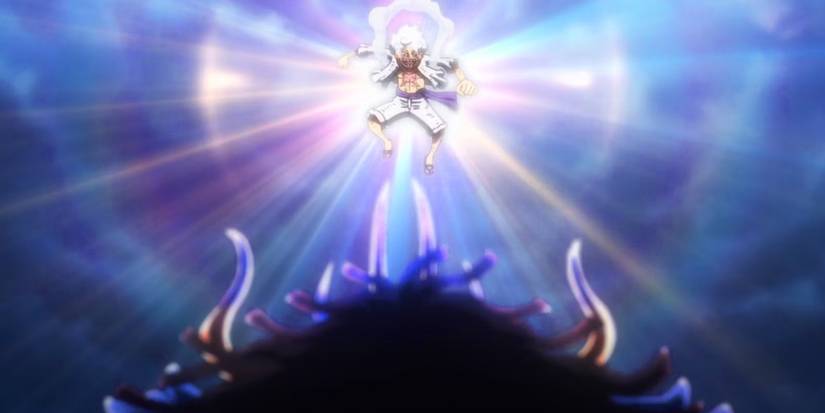 Screenshot from one piece anime shows Gear 5 Luffy floating above Kaido while a bright white light shines behind Luffy.