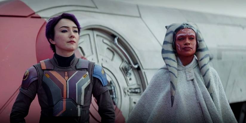 Sabine Wren and Ahsoka Tano in Ahsoka episode 8 stand looking suspiciously at someone off screen