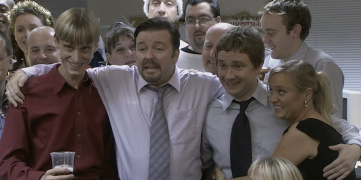 The Office UK cast posing for a picture