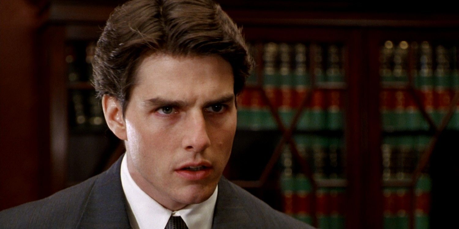 Tom Cruise as Mitch McDeere looking shocked in The Firm