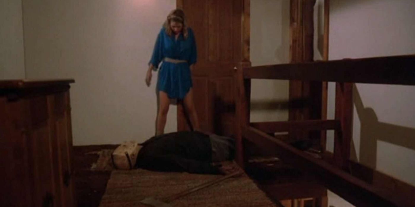 Trish Jarvis looks at a fallen Jason Voorhees.