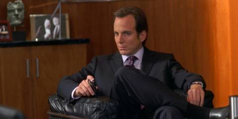 Will Arnett as Devon Banks sitting in Jack's office in 30 Rock