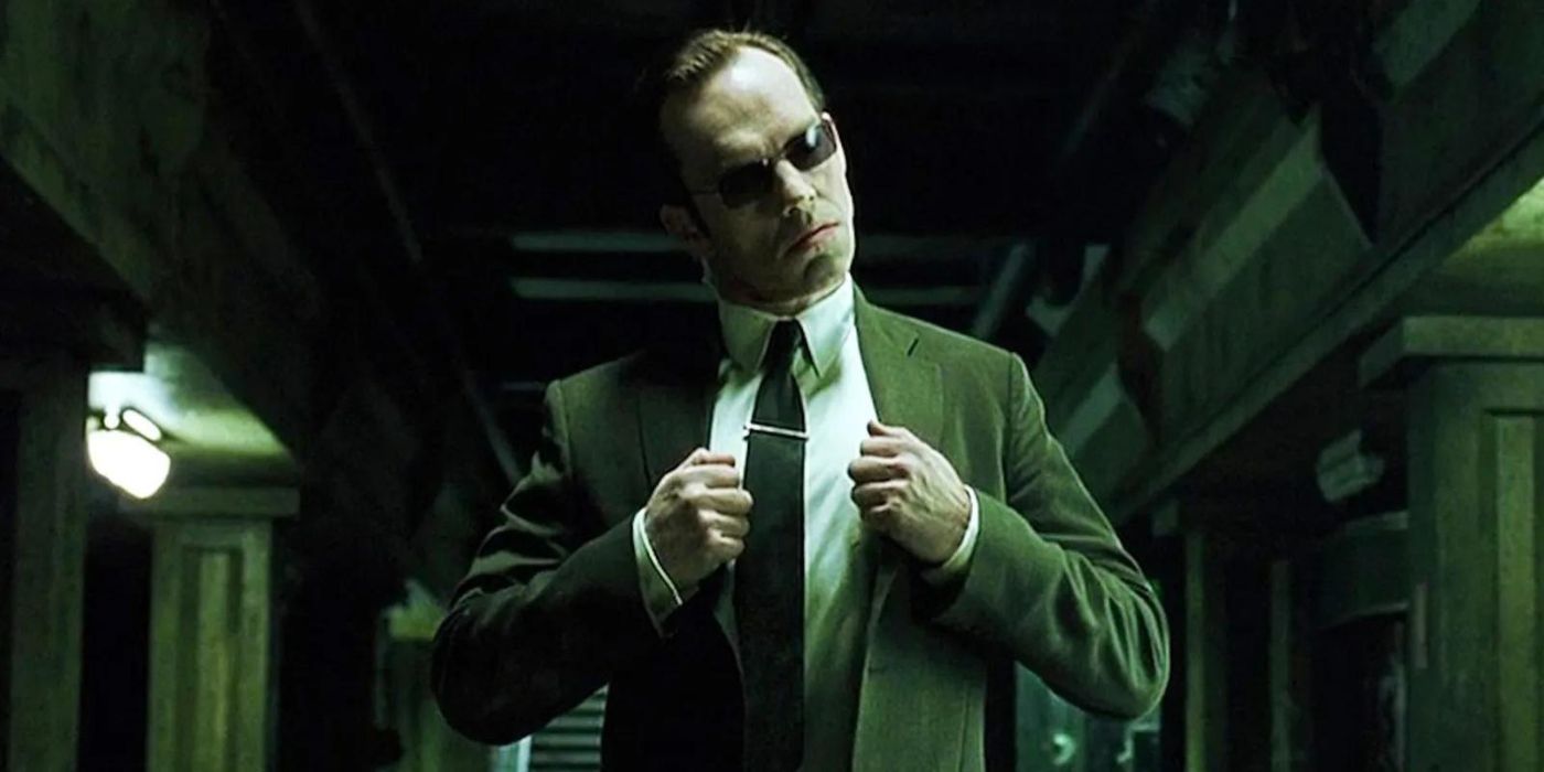 Agente Smith se preparando para lutar contra Neo em Matrix