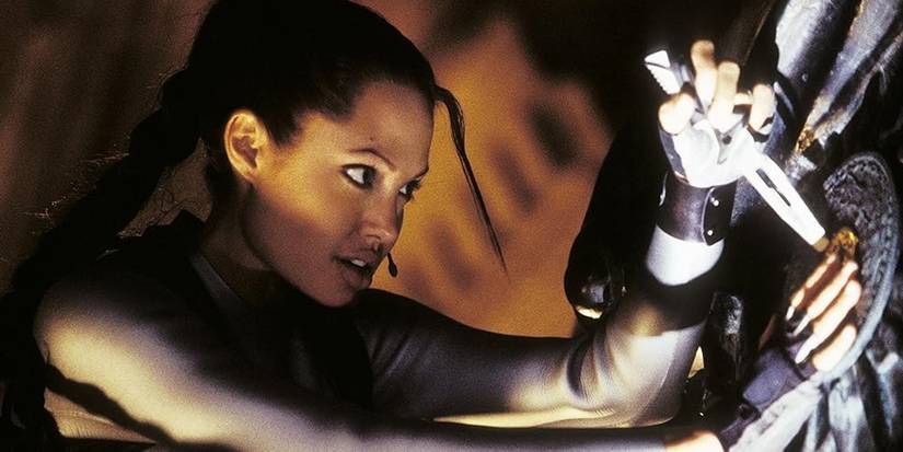 Angelina Jolie as Lara Croft using a knife in Tomb Raider
