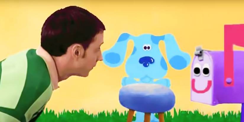 Blue in between Steve and Mailbox in Blue's Clues