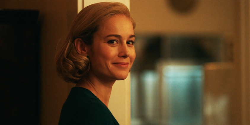 Brie Larson smiling as Elizabeth Zott in Lessons in Chemistry episode 8