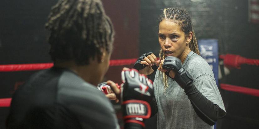 Bruised Halle Berry fighting in a ring